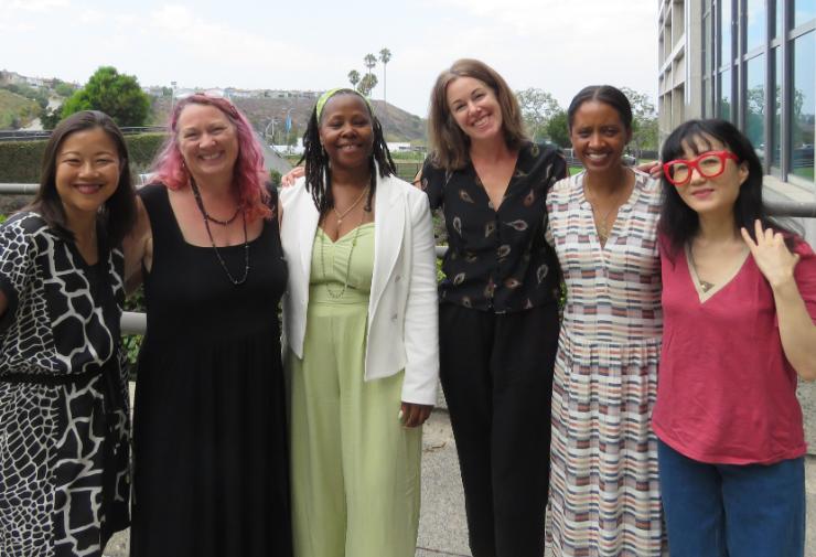 Six Women stand side by side